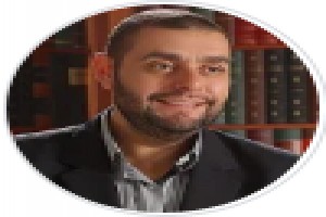 Portrait of author Ayman Al-Atoum